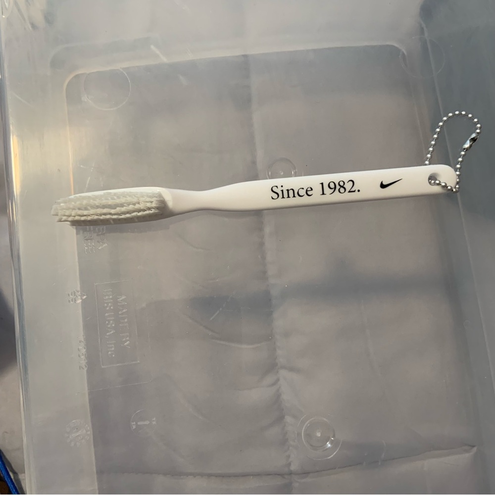 Nike White Keychain with Black Text TOOTHBRUSH